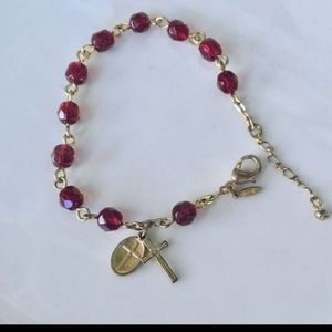 Avon signed SP red and gold-tone rosary bracelet.
